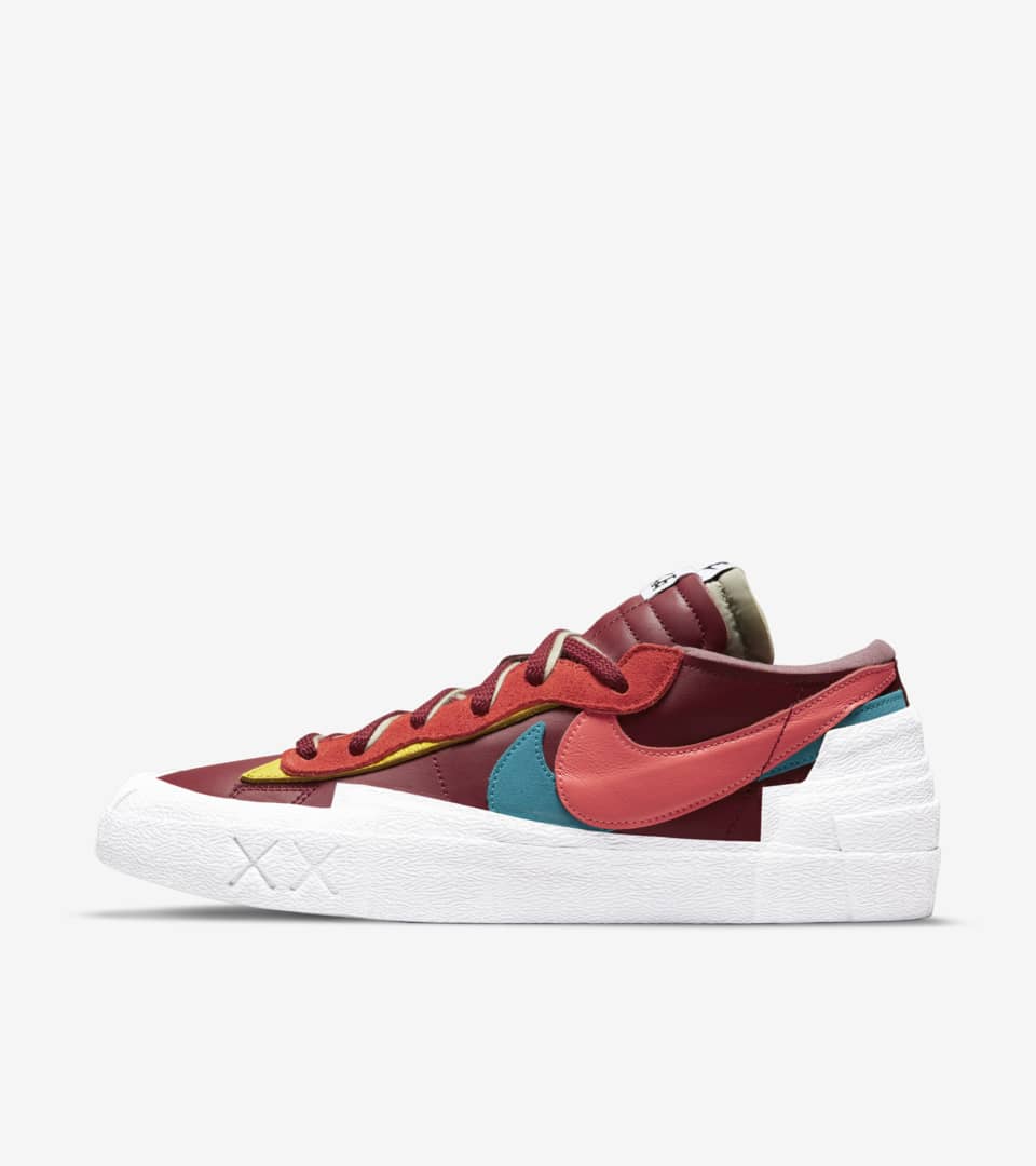nike x sacai x kaws blazer low team red
